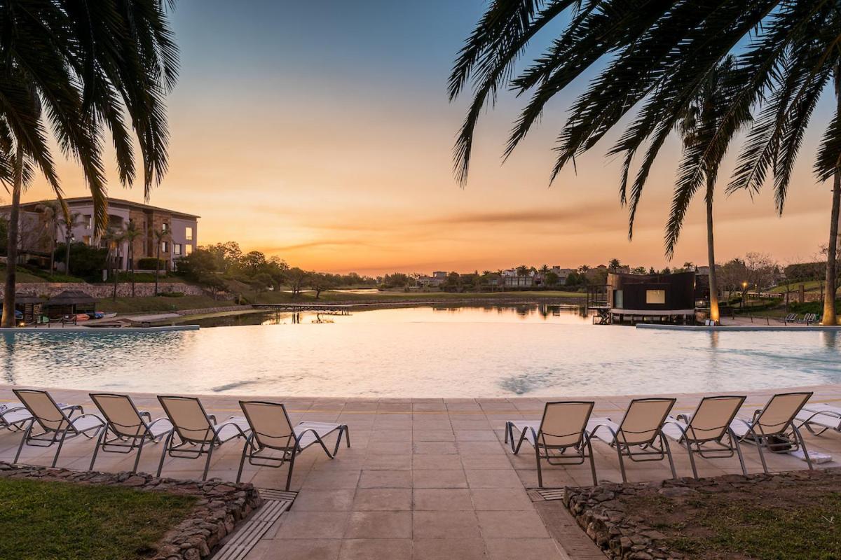 Sofitel La Reserva Cardales Rio Lujan Exterior photo Sunset at the Ritz-Carlton, Naples